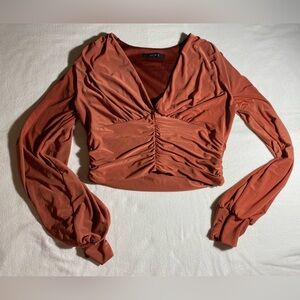 rust colored long sleeve blouse 🧶